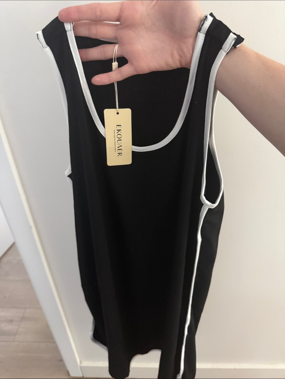 Womenโs Black pajama gown with White Piping